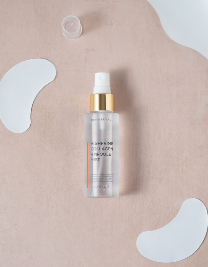 Dermarssance Highprime Collagen Ampoule Mist bottle flat lay with collagen patched around