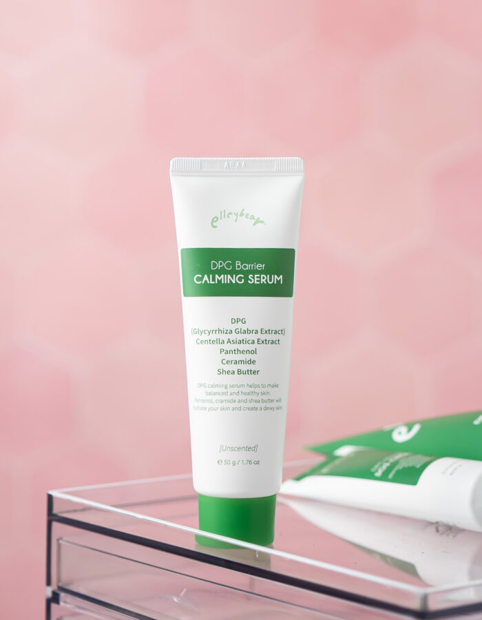 Elleybear DPG Barrier Calming Serum standing on top of clear container