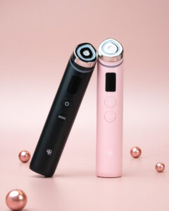 Medicube Age R Booster Pro EX device in pink and black