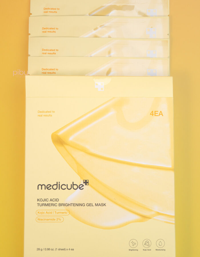 Four-pack of Medicube Kojic Acid Turmeric Brightening Gel Masks, featuring bright yellow packaging with product details.