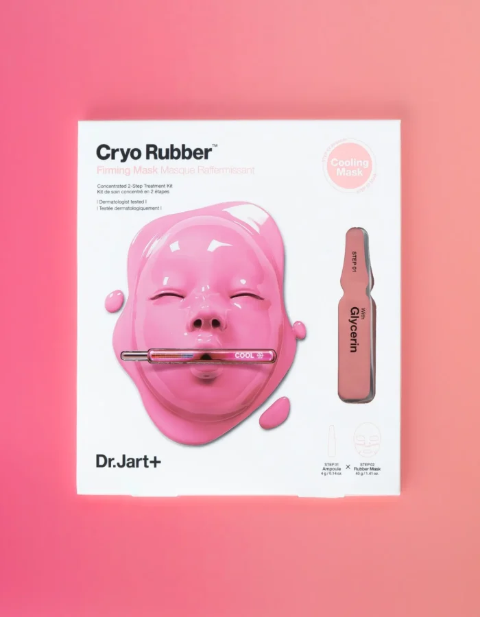 Packaging of Dr. Jart Cryo Rubber Firming Mask featuring a pink mask and ampoule, set against a pink background.
